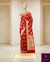 The Queen of Silks: A breathtaking Red Kanchipuram in an exquisite, all-over Gold Jaal.
