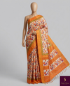 Orange floral saree :Bold, bright, and blooming. ✨