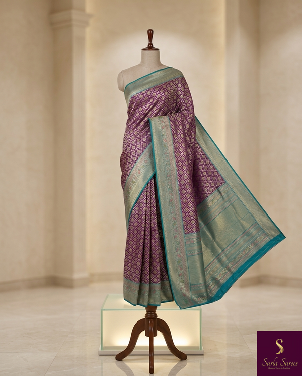 The Royal Amethyst: Purple Silk Saree with Teal-Green Korvai Border