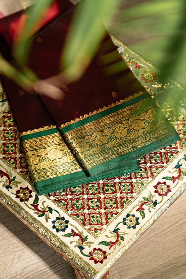 The Royal Garnet: Maroon Silk Saree with Emerald Green Korvai Border