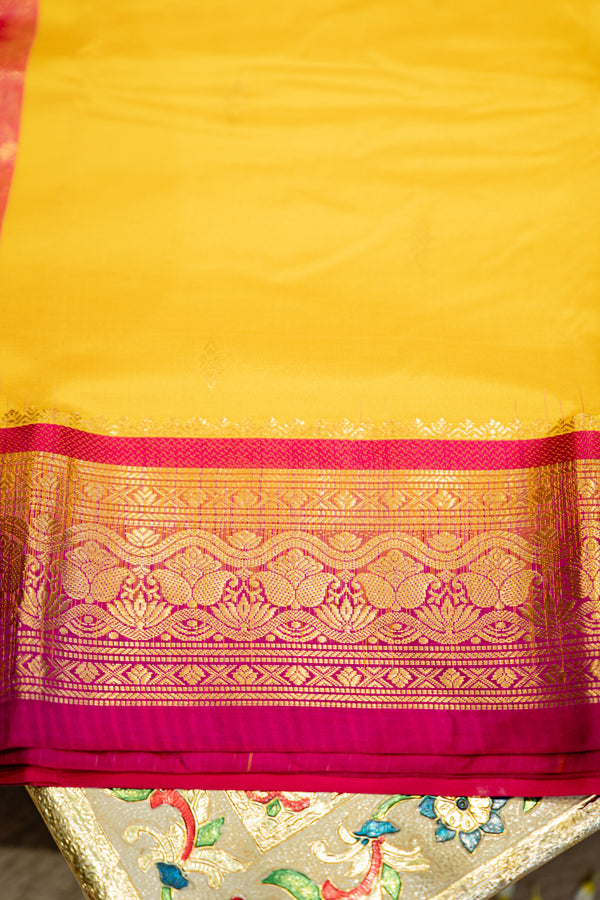 The Radiant Sunbeam: Canary Yellow Silk Saree with Magenta Contrast