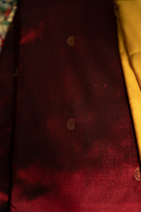 The Royal Garnet: Maroon Silk Saree with Emerald Green Korvai Border