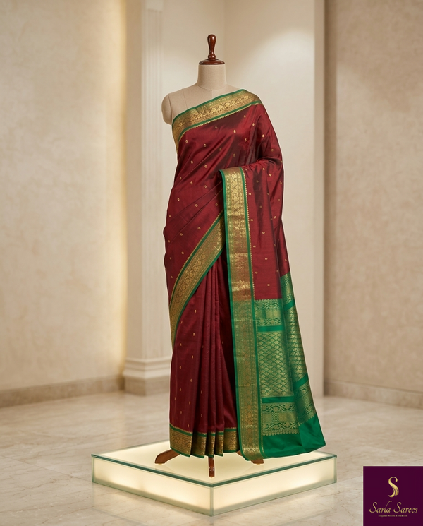 The Royal Garnet: Maroon Silk Saree with Emerald Green Korvai Border