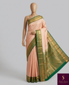 The Blush Orchard: Pastel Peach Silk Saree with Forest Green & Gold Border