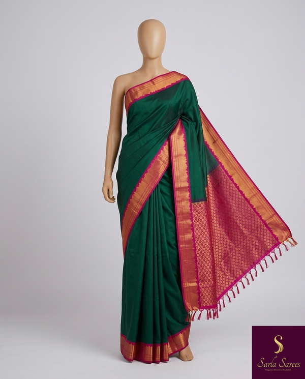The Emerald Empress: Deep Bottle Green Kanchipuram Silk Saree with Magenta Brocade Blouse