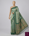 The Jade Meenakari: Sea-Green Brocade Silk Saree with Peacock & Paisley Pallu