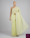 The Limelight Glow: Pastel Lemon Linen Saree with Micro-Floral Weaving & Silver Borders