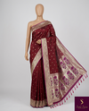 The Royal Loom: Crimson Maroon Kanchipuram Saree with Golden Zari & Fuchsia Floral Pallu