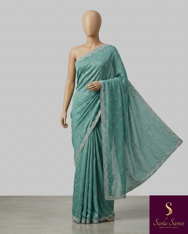 The Sage Horizon: Sea Green Textured Georgette Saree with Scalloped Moti & Cutdana Work Border