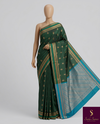 The Emerald Court: Forest Green Silk Saree with Turquoise Contrast Pallu