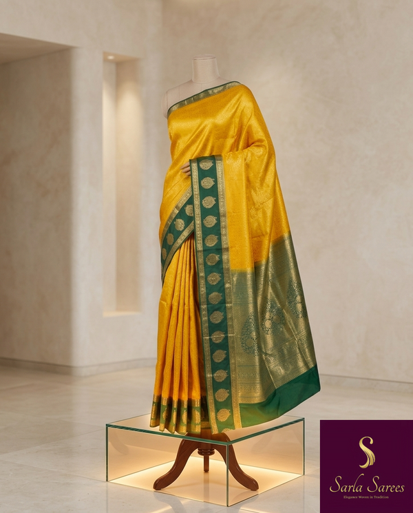 The Temple Sun: Golden Yellow Kanchipuram Silk Saree with Emerald Green Zari Border