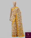 The Marigold Meadow: Cream Printed Saree with Vibrant Yellow Textured Border