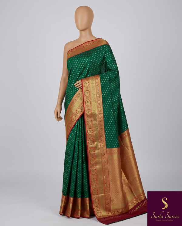 The Emerald Queen: Emerald Green Silk Saree With Crimson Red Zari Border