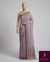 The Lavender Tarang: Pastel Mauve Linen Saree With Multi-Color Floral Weaving