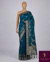 The Mayura Teal: Deep Peacock Blue Woven Saree with Hand-Worked Accents