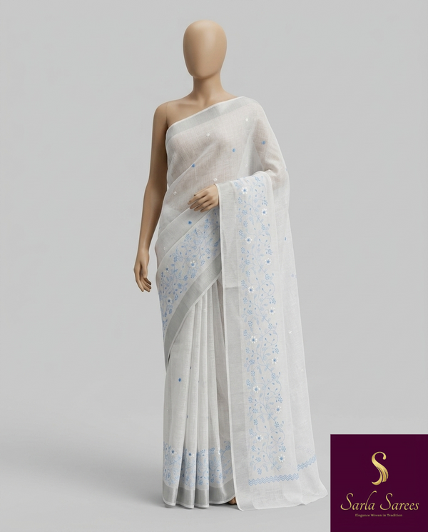 The Ivory Nila: Pure White & Powder Blue Embroidered Cotton Saree