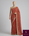 The Tanvi Lavanya: Rust Terracotta Embroidered Georgette Saree