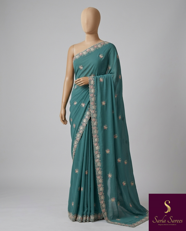The Tanvi Riva: Peacock Teal Floral Embroidered Georgette Saree