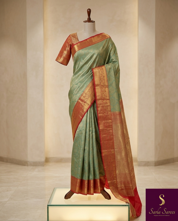The Vasundhara Vilasa: Sage Green & Coral Red Kanchipuram Tissue Silk Saree