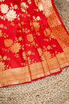 The Queen of Silks: A breathtaking Red Kanchipuram in an exquisite, all-over Gold Jaal.