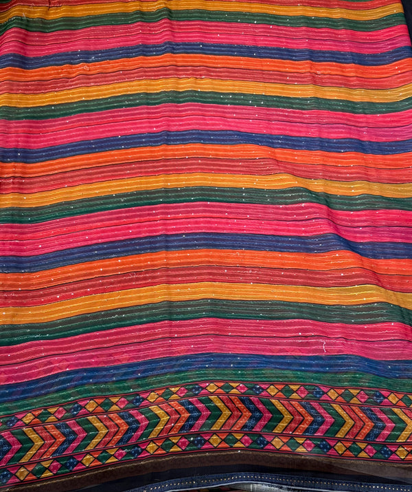 The Bohemian Symphony: Multicolor Striped Tussar Silk Saree with Ikat Borders