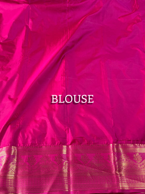 The Festive Zest: Parrot Green Kanchipuram Silk Saree with Rani Pink Zari Border