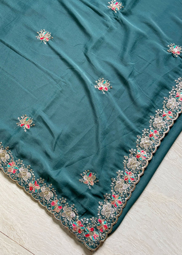 The Tanvi Riva: Peacock Teal Floral Embroidered Georgette Saree