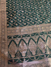 The Emerald Heritage: Deep Bottle Green Banarasi Silk Saree With Antique Gold Zari Jaal