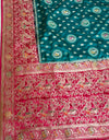 The Empress Teal: Teal Blue Banarasi Katan Silk Saree with Crimson Shikargah Border & Swarovski Crystals