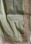 The Sage Luminary: Metallic Sage Green Silk Tissue Saree with Silver Lace Border