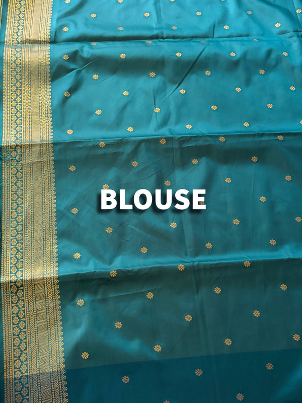 The Emerald Nila: Sage Green & Teal Woven Zari Silk Saree