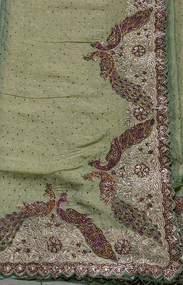 The Ananya Mayura: Pistachio Green Handworked Georgette Saree