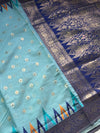 The Cerulean Citadel: Powder Blue Pure Linen Saree with Royal Indigo & Temple Border