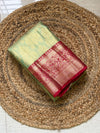 The Vasundhara Vilasa: Sage Green & Coral Red Kanchipuram Tissue Silk Saree