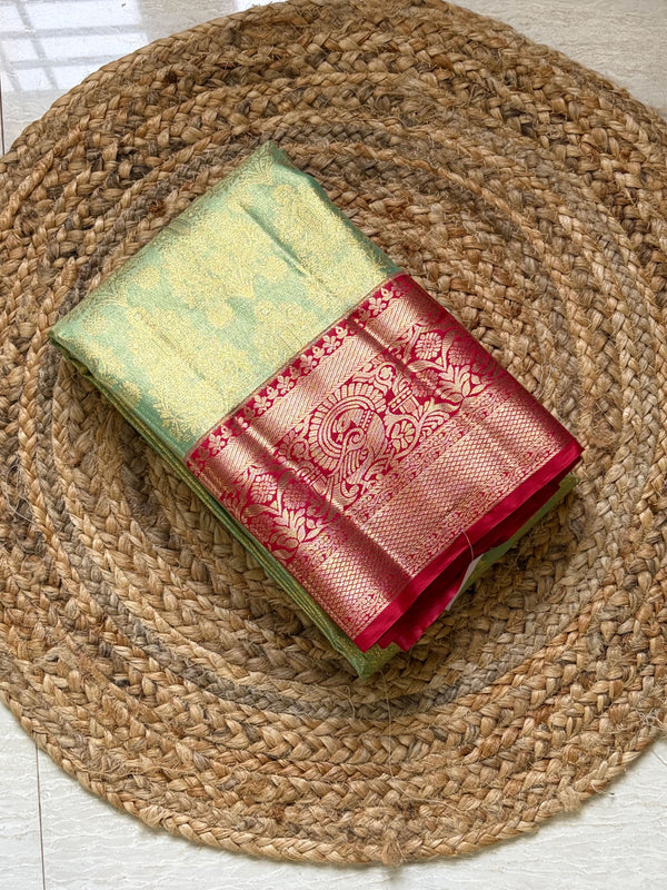 The Vasundhara Vilasa: Sage Green & Coral Red Kanchipuram Tissue Silk Saree