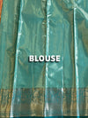 The Mridula Vilasa: Peach-Coral & Sea Green Kanchipuram Tissue Silk Saree