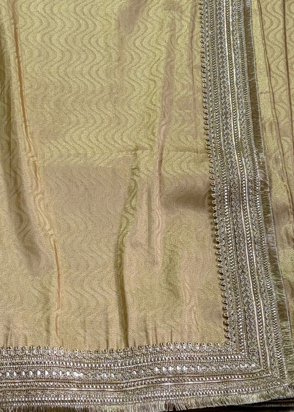 The Gilded Glamour: Metallic Gold Drape with Intricate Silver Lace Border