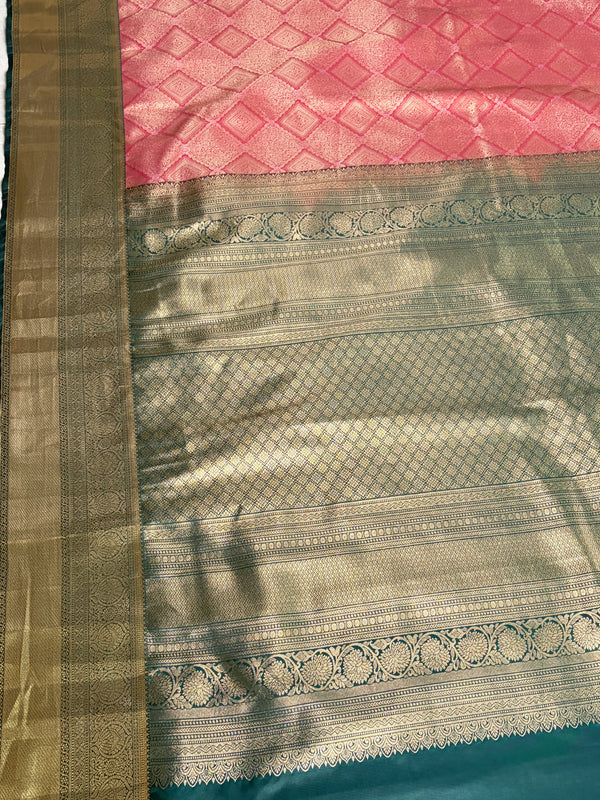 The Kalyani Mayura: Coral Peach & Bottle Green Kanchipuram Silk Saree