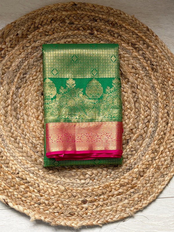 The Devika Mayura: Parrot Green & Rani Pink Kanchipuram Silk Saree