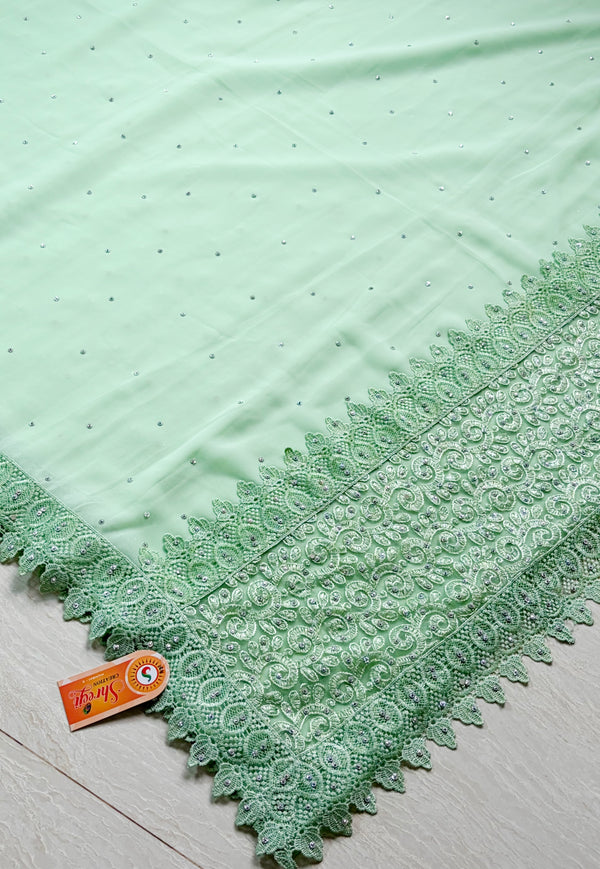 The Avani Vilasa: Mint Green Embroidered Georgette Saree