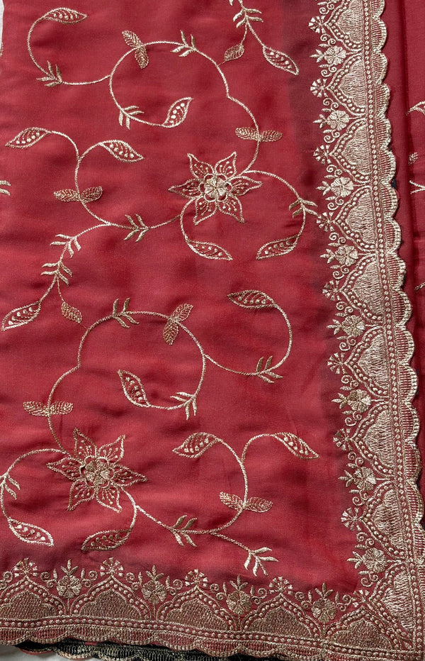 The Tanvi Lavanya: Rust Terracotta Embroidered Georgette Saree