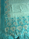 The Mint Meadow: Mint Green Linen Saree with Turquoise Floral Borders