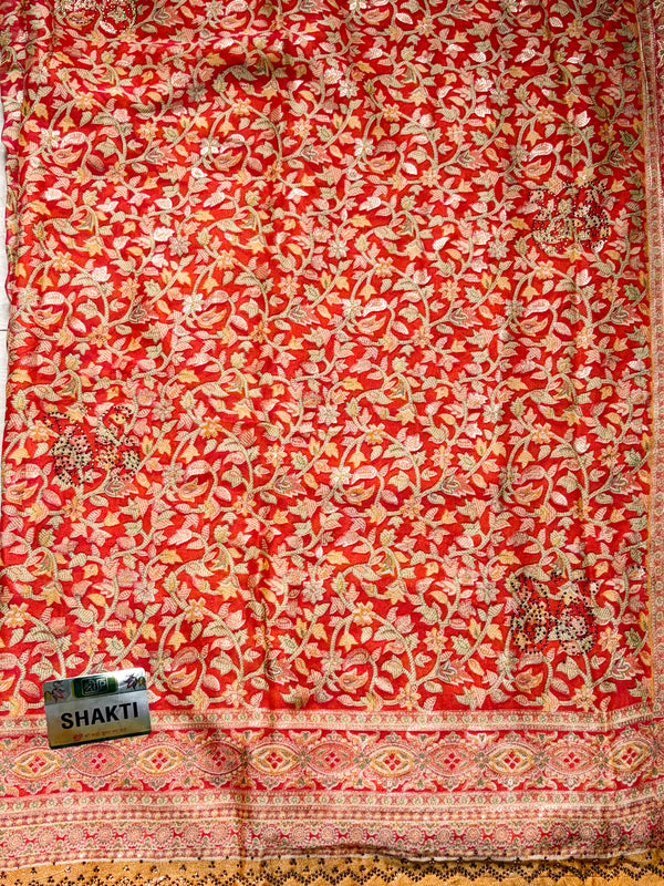 The Mandira Riva: Rust Orange & Golden Amber Printed Brasso Saree