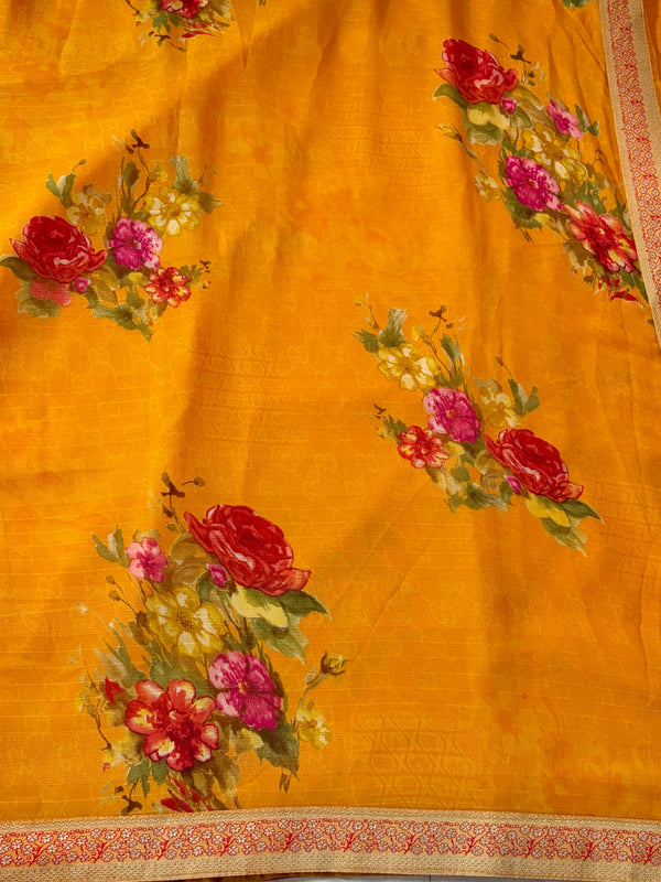 The Charvi Riva: Marigold Yellow Floral Printed Georgette Saree