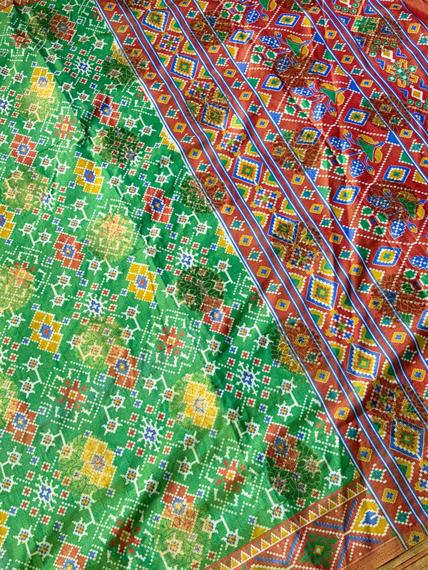 The Meenakshi Vilasa: Emerald Green Patola & Bandhani Saree