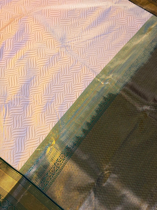The Blush Orchard: Pastel Peach Silk Saree with Forest Green & Gold Border