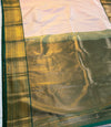 The Blush Orchard: Pastel Peach Silk Saree with Forest Green & Gold Border