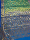 The Mayura Vilasa: Teal Green & Royal Blue Woven Banarasi Saree