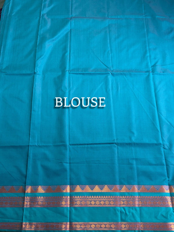 The Emerald Court: Forest Green Silk Saree with Turquoise Contrast Pallu