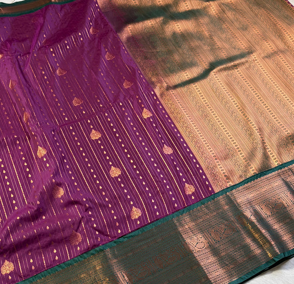 The Amethyst Temple: Deep Plum Kanchipuram Silk Saree with Emerald & Gold Border